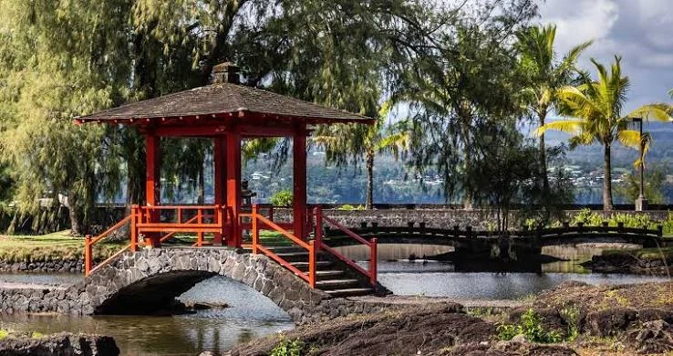 Japanese garden pond, stone lantern and arched bridge at Liliʻuokalani Gardens